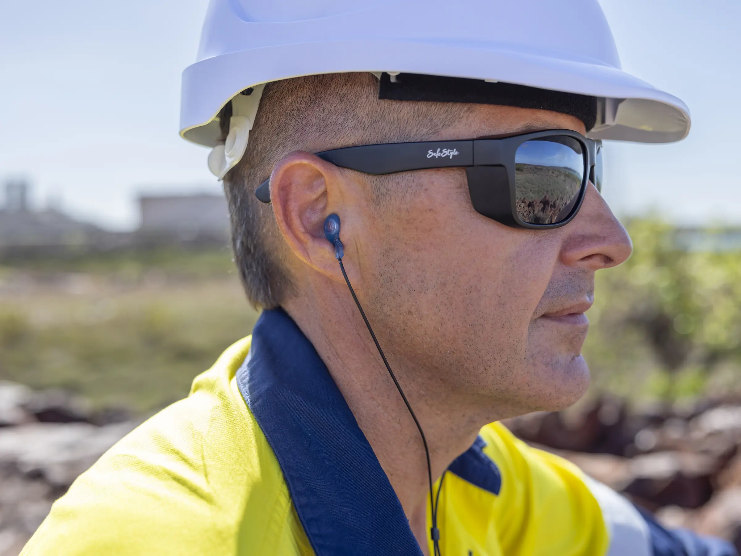 Worker profile wearing custom hearing protection