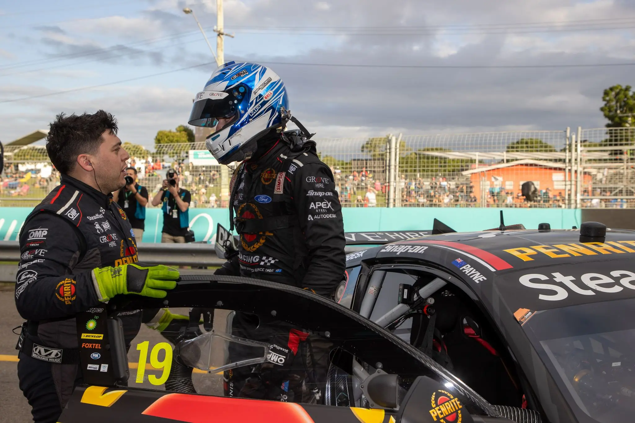High-noise motorsport environment requiring specialist hearing protection